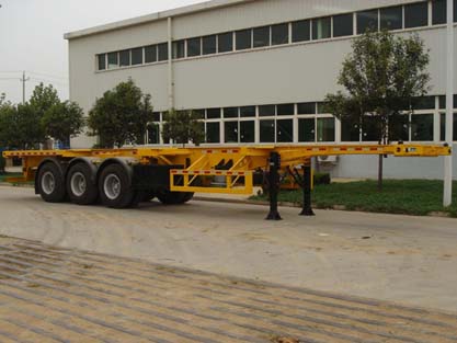 青特12.3米33吨集装箱运输半挂车(QDT9400TJZG)