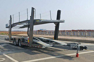 摩天牌12米10.7吨2轴中置轴车辆运输挂车(JKS9182TCL)
