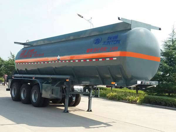 骏通牌10米32.5吨3轴腐蚀性物品罐式运输半挂车(JF9403GFW)