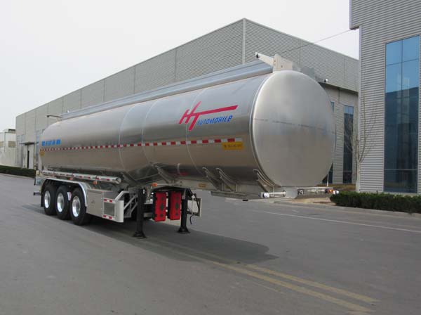 冀宁宏泰牌11米34吨3轴润滑油罐式运输半挂车(NHT9402GRH)