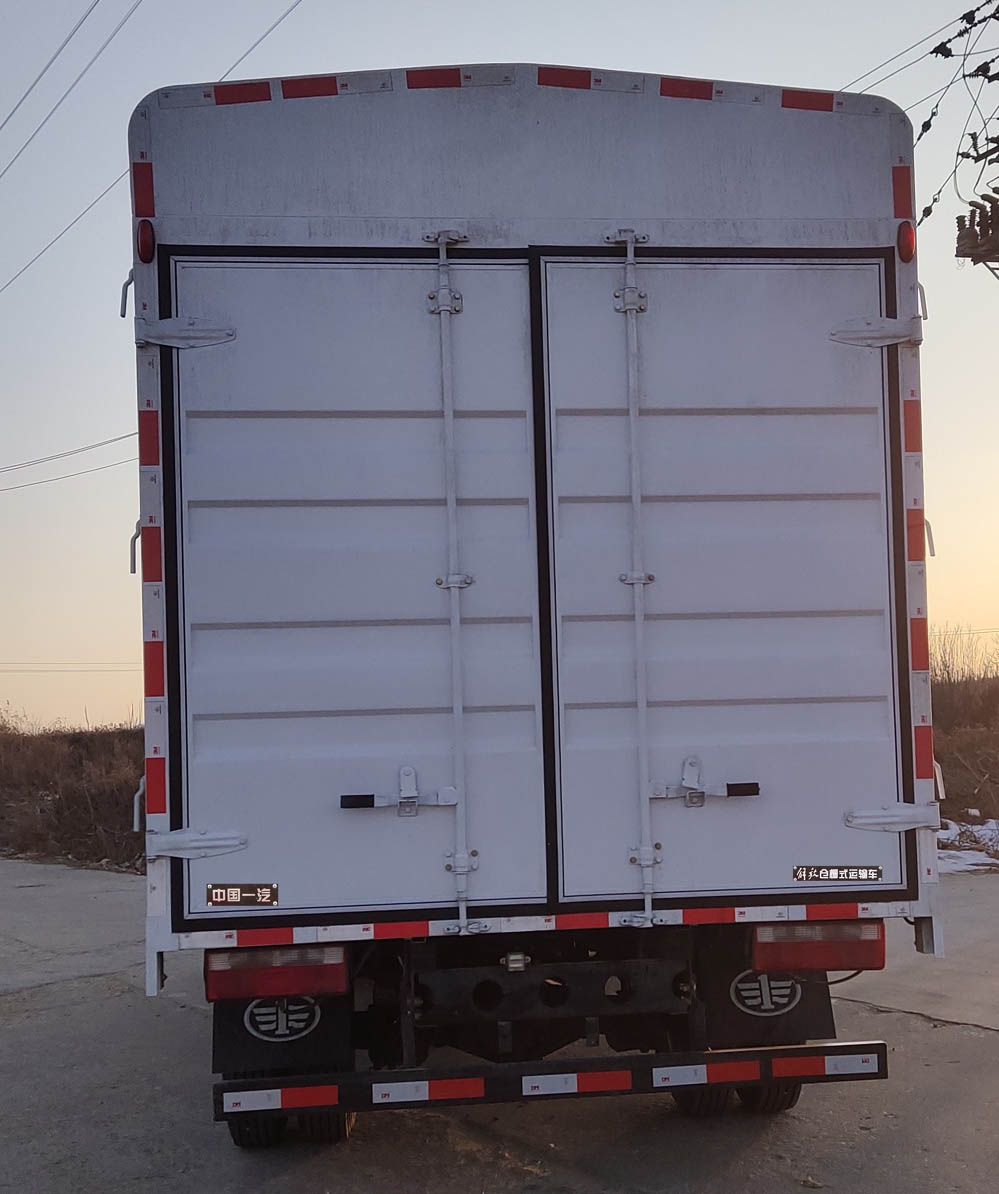 解放牌CA5073CCYP40K61L2E6A84倉柵式運(yùn)輸車公告圖片