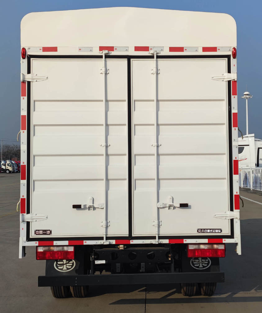 解放牌CA5045CCYP40K50L2E6A85倉(cāng)柵式運(yùn)輸車公告圖片