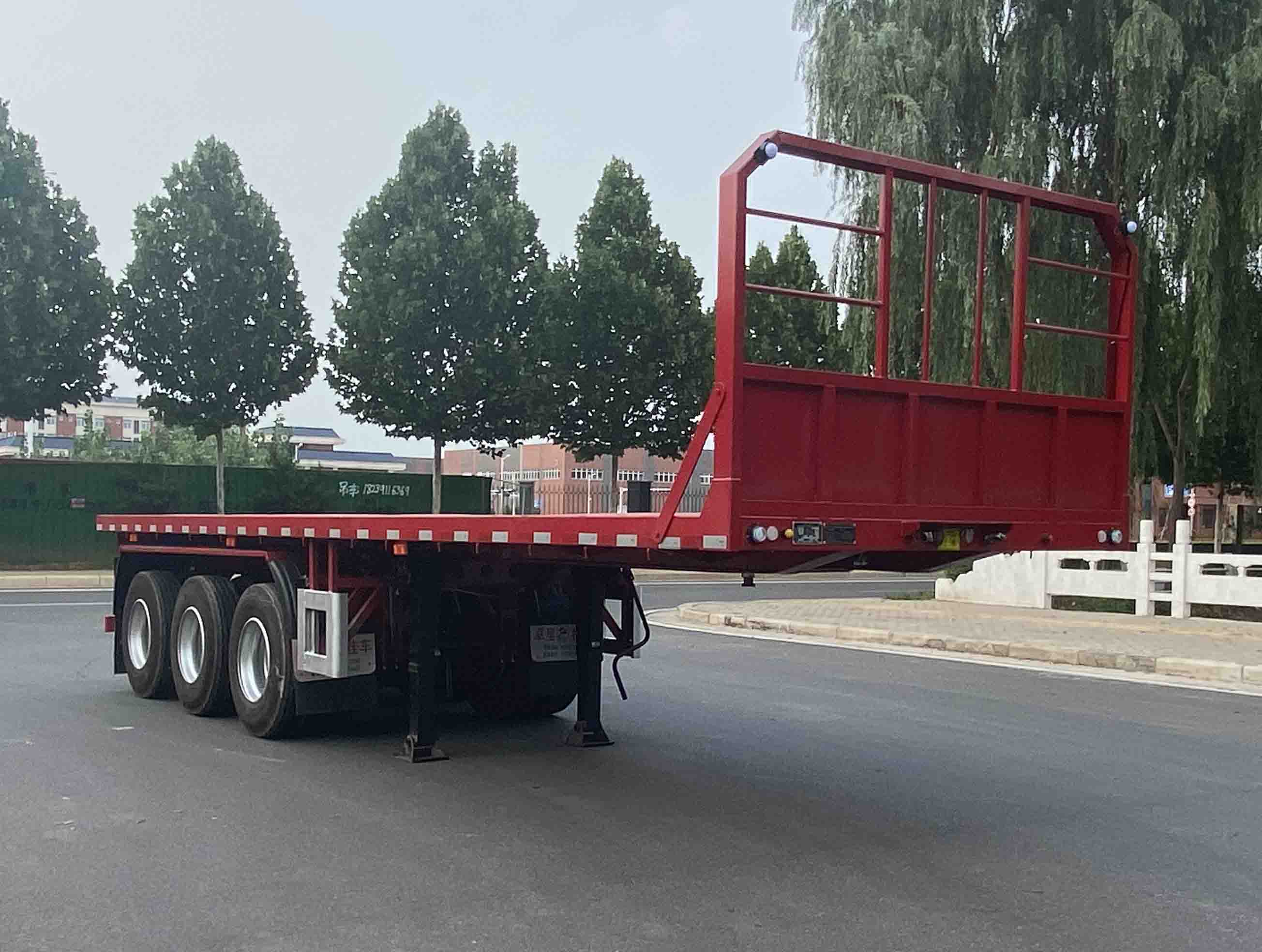 卓里-克劳耐牌9米35.2吨3轴平板运输半挂车(SXL9400TPB)