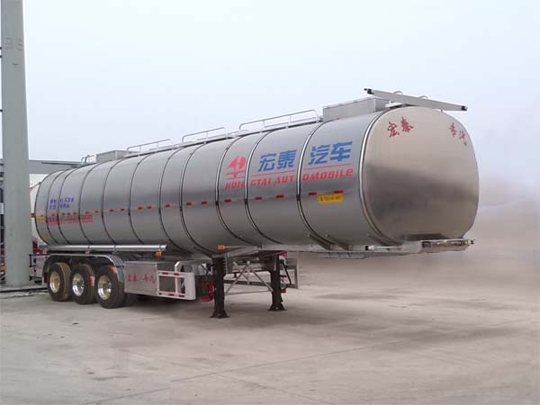 正康宏泰牌11米34吨3轴润滑油罐式运输半挂车(HHT9403GRH)