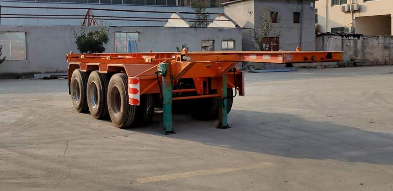 新宇牌8.5米35.5吨3轴集装箱运输半挂车(XJQ9400TJZG)