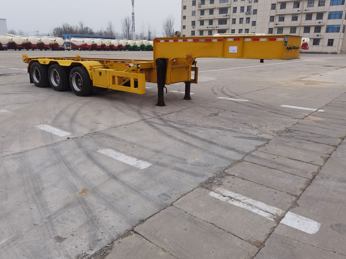玖杰通达牌9.9米35吨3轴集装箱运输半挂车(JJV9401TJZE)