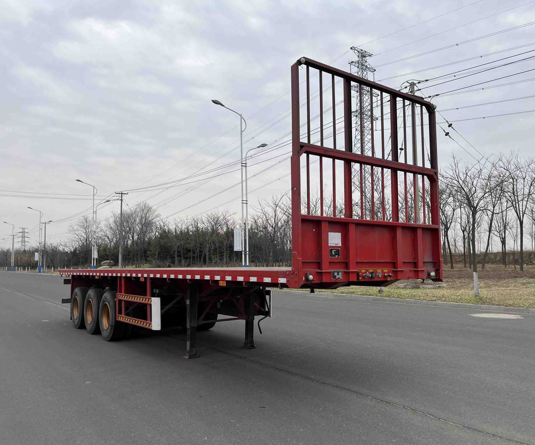 事业长兴牌11.5米34.9吨3轴平板运输半挂车(CXC9401TPB)