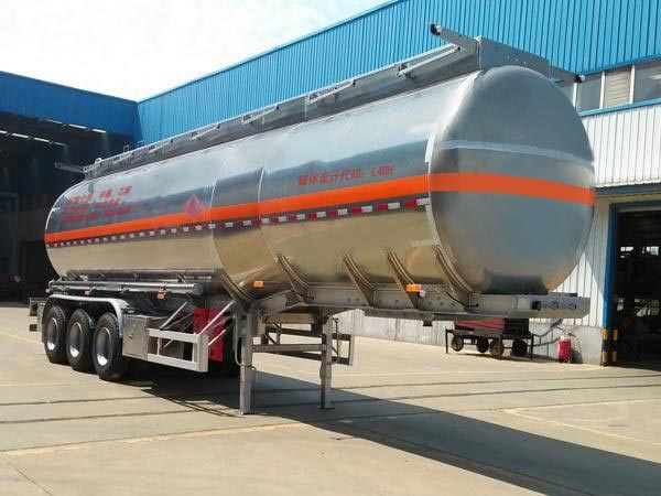 骏通牌11.8米33.7吨3轴铝合金易燃液体罐式运输半挂车(JF9407GRY)