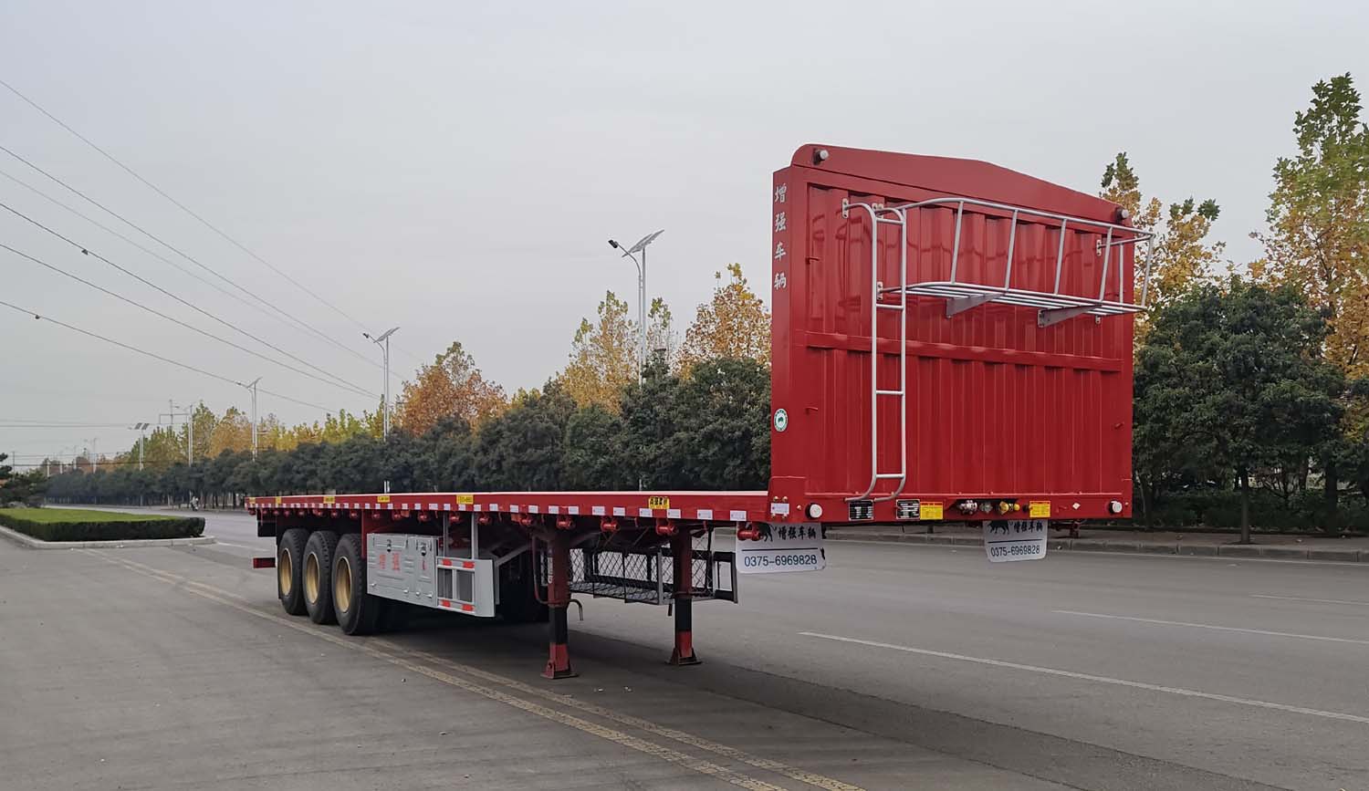 周增强牌13米34.2吨3轴平板运输半挂车(RZQ9401TPB)