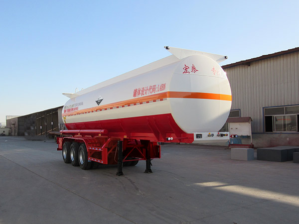 正康宏泰牌10米32.7吨3轴腐蚀性物品罐式运输半挂车(HHT9403GFWA)