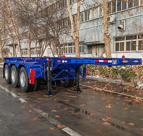 五岳牌7.6米35.7吨3轴集装箱运输半挂车(TAZ9406TJZC)