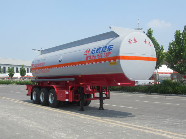 正康宏泰牌10.7米31.7吨3轴腐蚀性物品罐式运输半挂车(HHT9406GFWA)