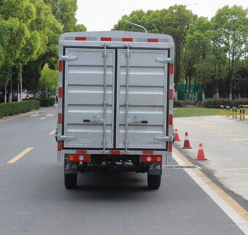 東風(fēng)牌EQ5030CCYD60Q4AAC倉(cāng)柵式運(yùn)輸車公告圖片