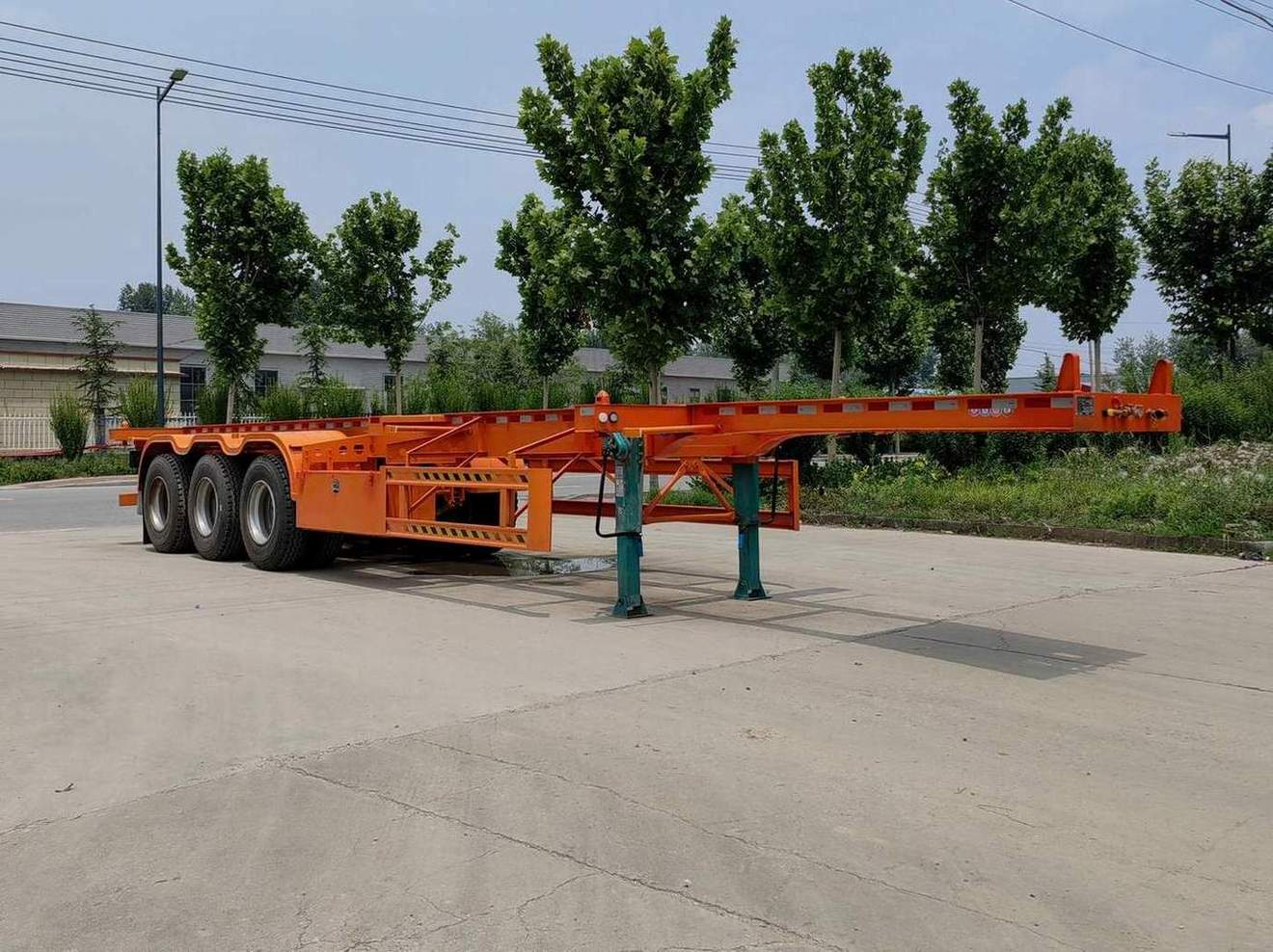 梁旭牌12米34.4吨3轴集装箱运输半挂车(MGY9403TJZ)