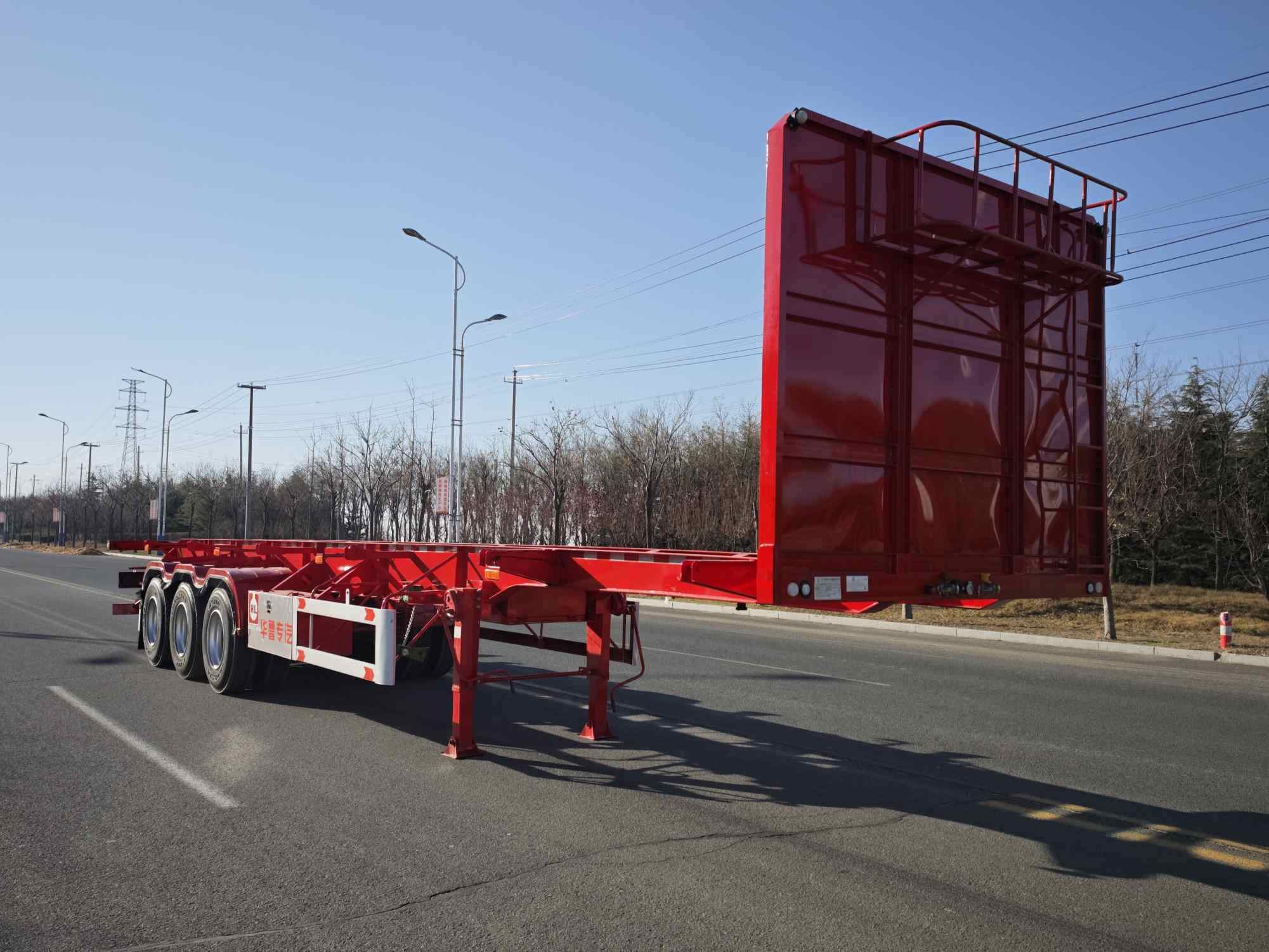 华鲁业兴牌13米35.2吨3轴运材半挂车(HYX9400TYC)