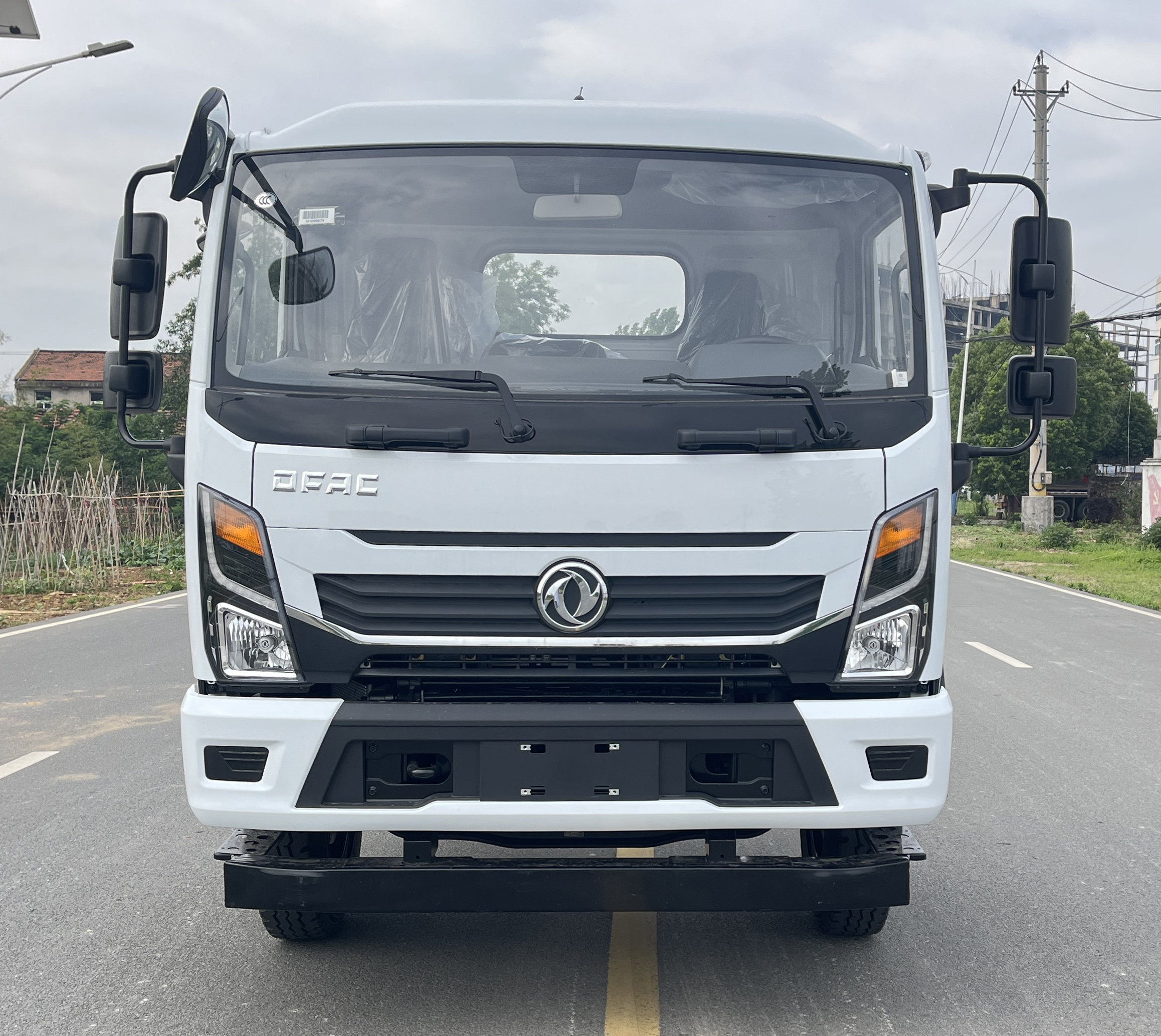 東風(fēng)股份多利卡D7 CSC5120ZBS6擺臂式垃圾車公告圖片