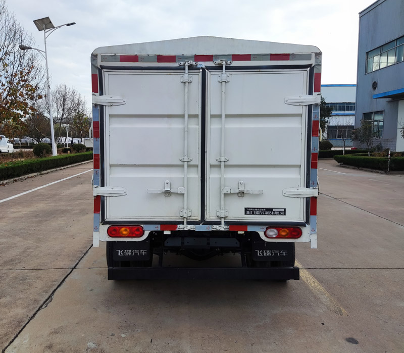 飛碟牌FD5040CCYW16K6-3倉柵式運(yùn)輸車公告圖片