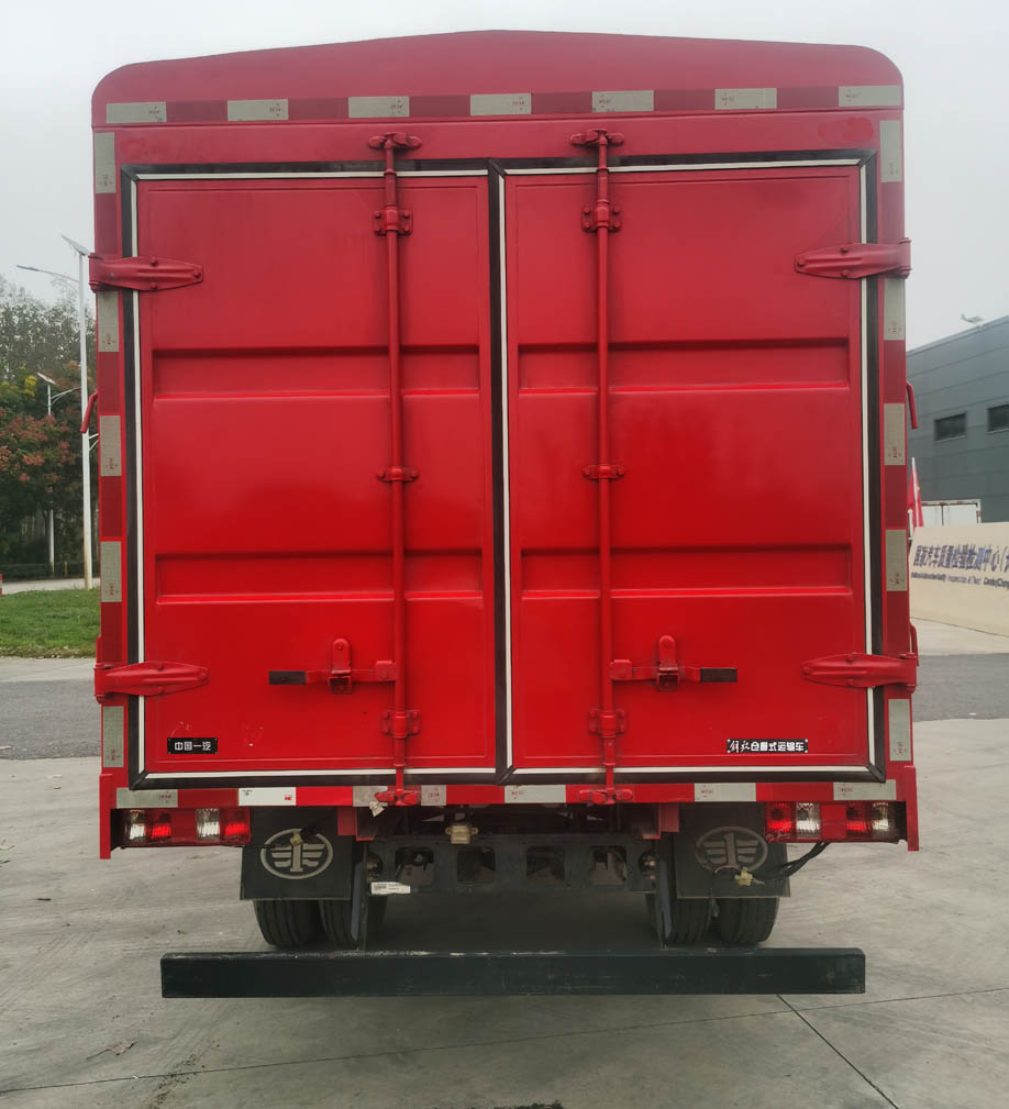 解放牌CA5041CCYP40K51L2RE6A85倉柵式運(yùn)輸車公告圖片